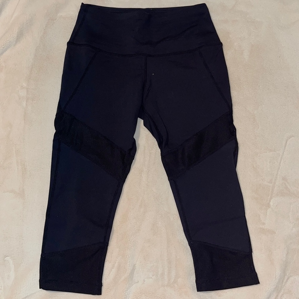 Ryderwear capris with mesh, size small.